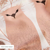 Symmetrical pattern of stylized pink owls with decorative floral medallions on white background