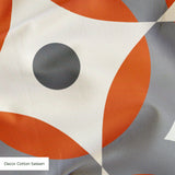 Mod Montez in Fire — mod montez print, in a cream star on a bright orange ground with a charcoal center