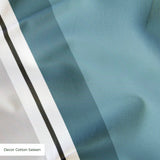 Vertical stripes in gray, dark charcoal, teal, light blue-gray, and white forming a geometric patter