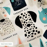 Colorful therapy dog illustration pattern featuring various dog breeds in teal, black, cream and pin