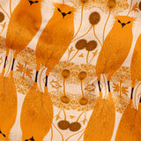 Symmetrical pattern of orange owls with brown details on beige background with decorative floral ele
