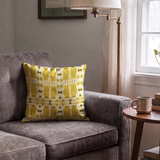 Stylized golden owls in symmetrical Art Nouveau pattern with floral motifs on cream background