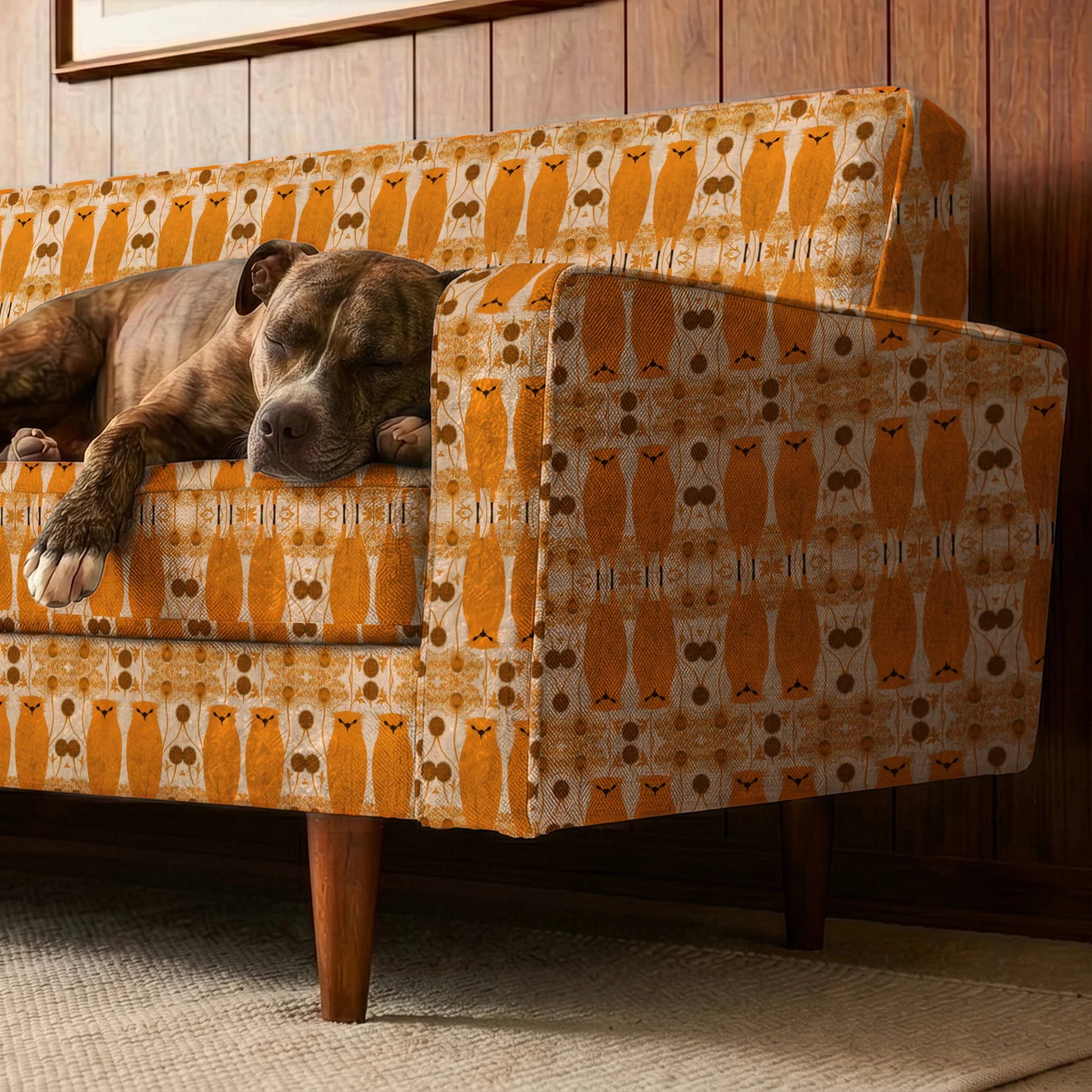 Symmetrical pattern of orange owls with brown details on beige background with decorative floral ele