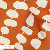 Atomic Stack in Persimmon — atomic stack print, in white forms on a warm persimmon orange ground