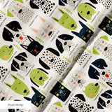 Good Dogs Club in Avocado — good dogs club print, in cream and black dogs with avocado green accents on a soft cream ground, small scale