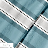 Vertical stripes in gray, dark charcoal, teal, light blue-gray, and white forming a geometric patter
