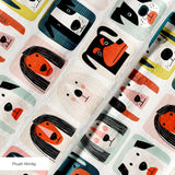 Colorful grid pattern of stylized dog faces in various breeds with geometric shapes and retro color