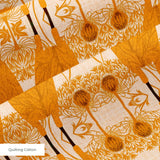 Symmetrical pattern of orange owls with brown details on beige background with decorative floral ele