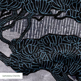 Stylized Japanese landscape with layered trees in blue, purple, and white with fan-shaped canopies
