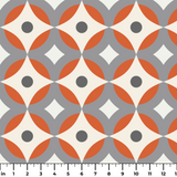 Mod Montez in Fire — mod montez print, in a cream star on a bright orange ground with a charcoal center